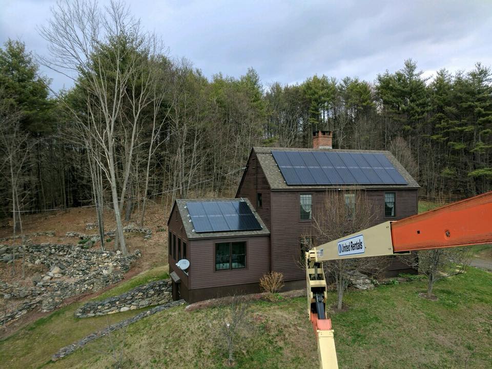 A home being serviced by a solar energy system company near Morristown, VT